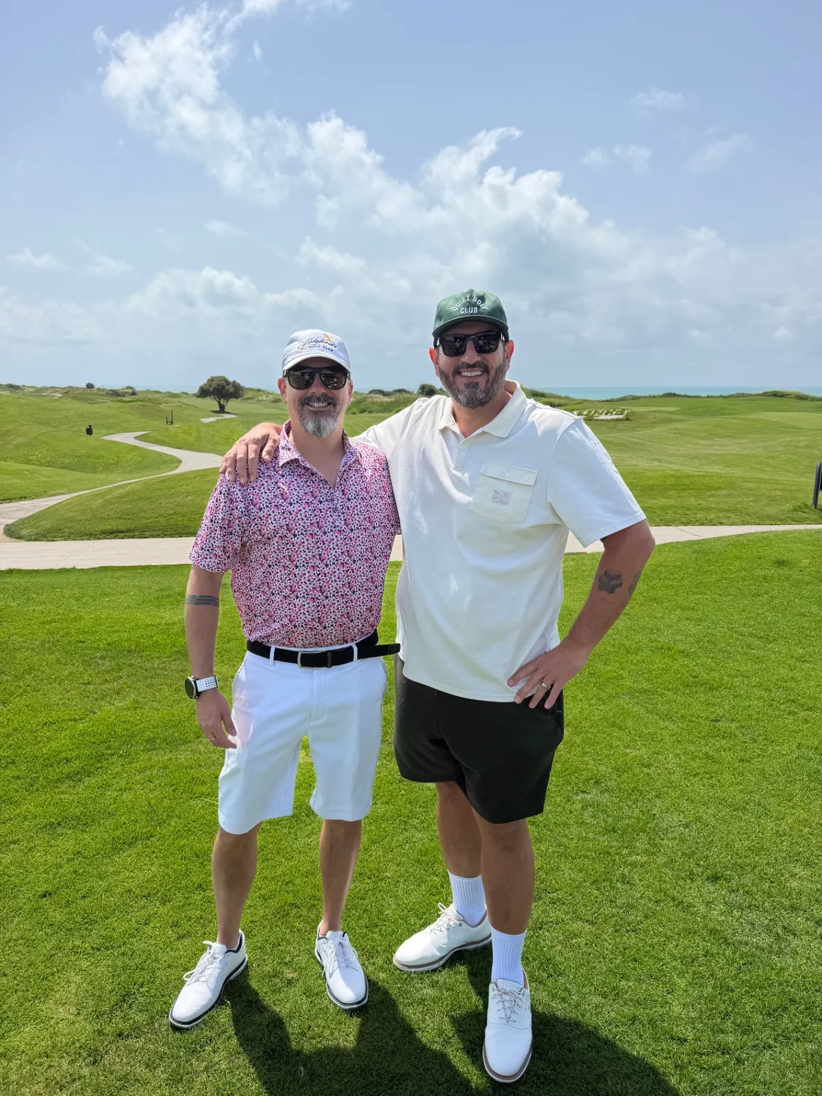 Two members on a coastal course