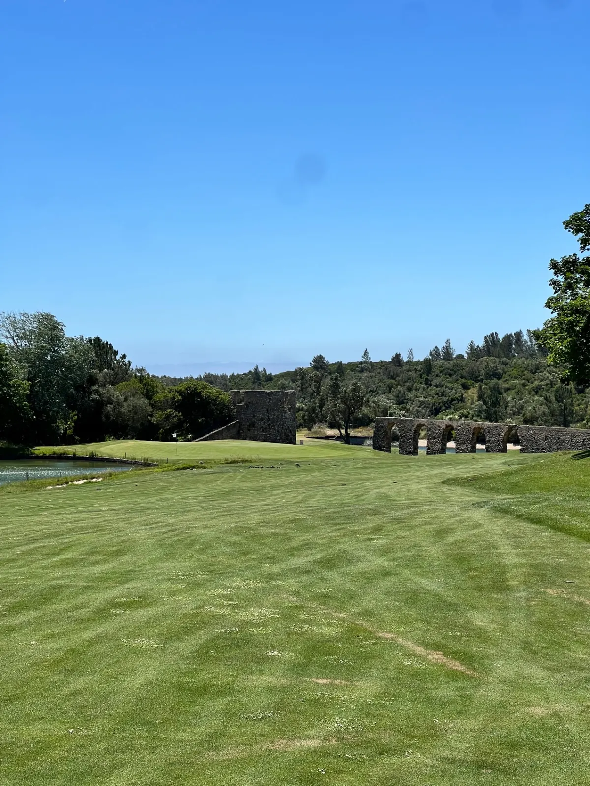 Aqueduct ruins beside the fairway