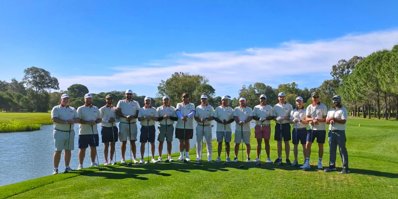 Full team lined up on the fairway